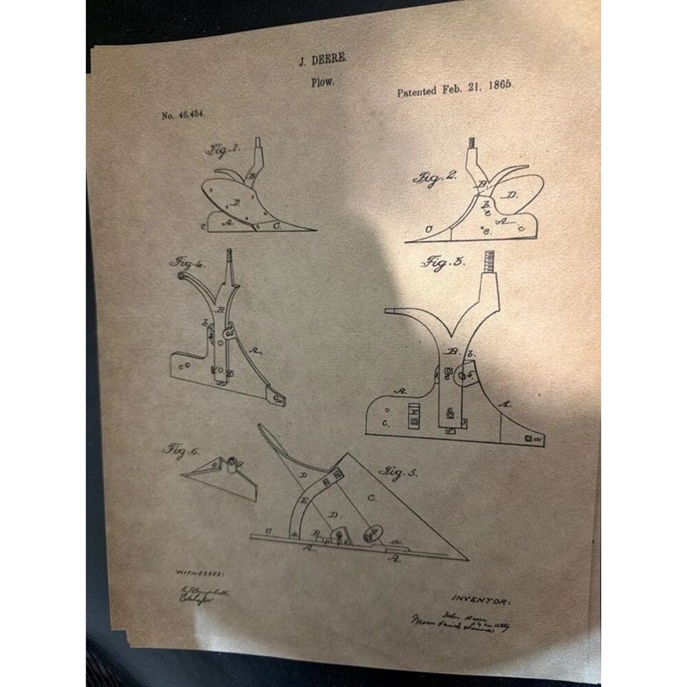 vintage-style novelty reprint of a John Deere plow patent